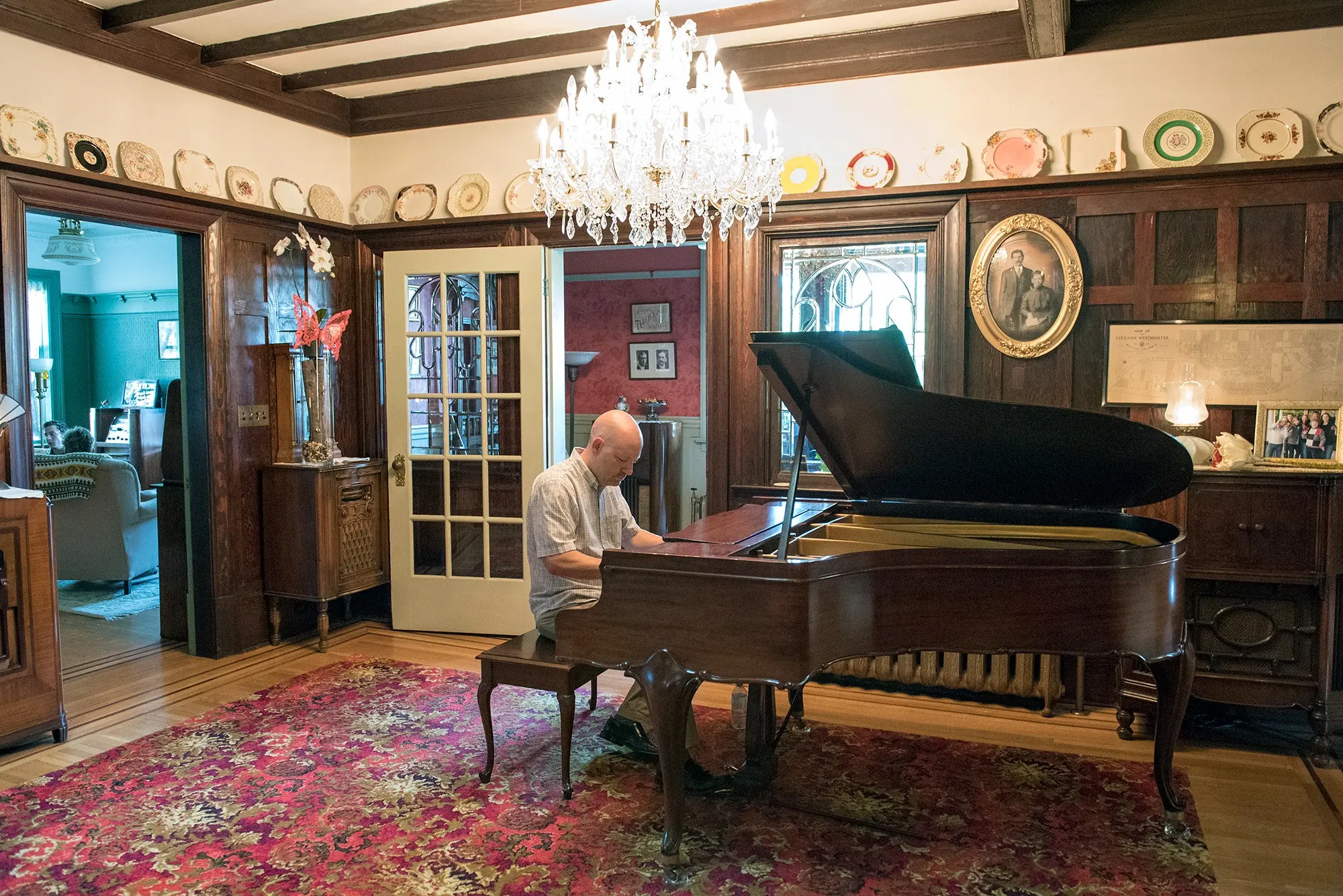Paul performing on a grand piano